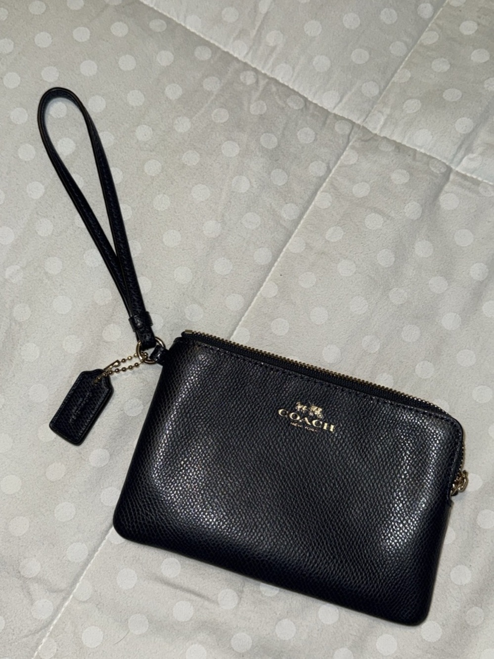 Coach Navy Pebbled Leather Wristlet with Gold Logo